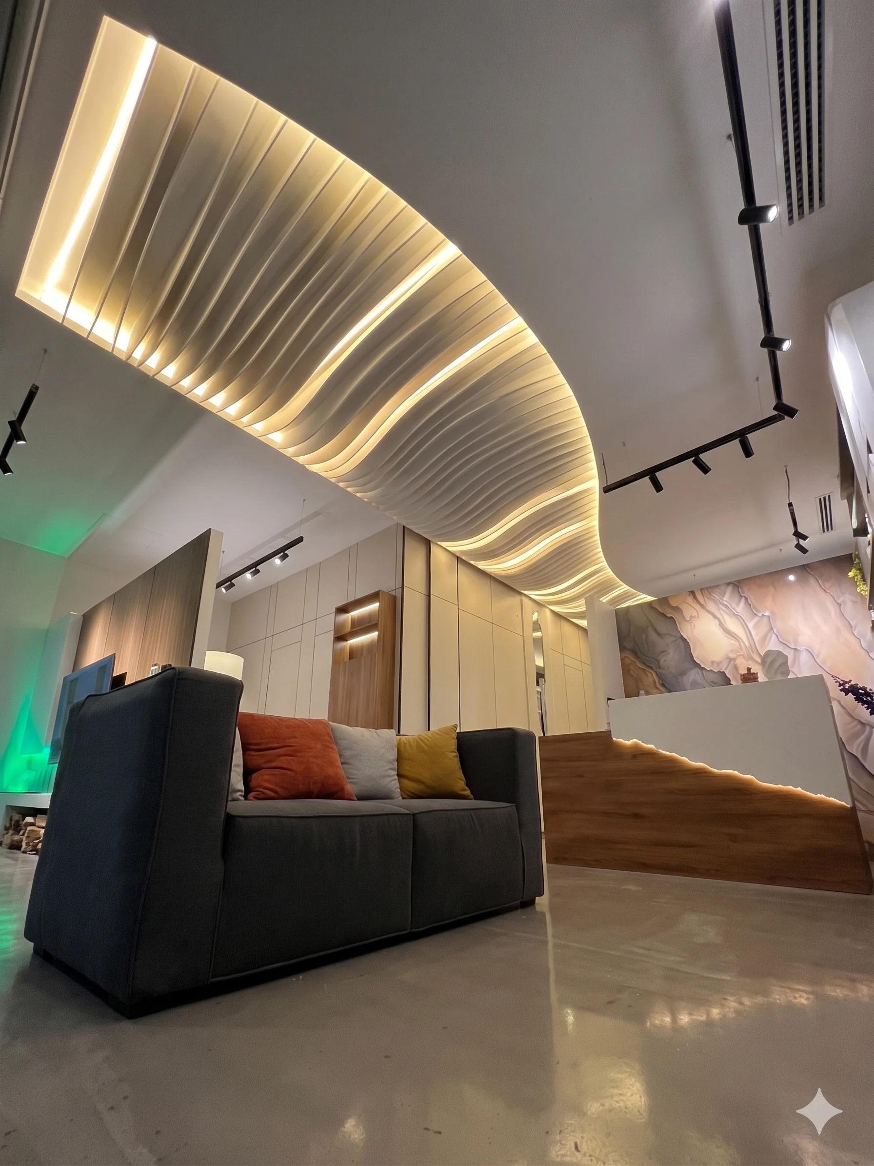 Sculpted gypsum ceiling — wave-cut showroom feature