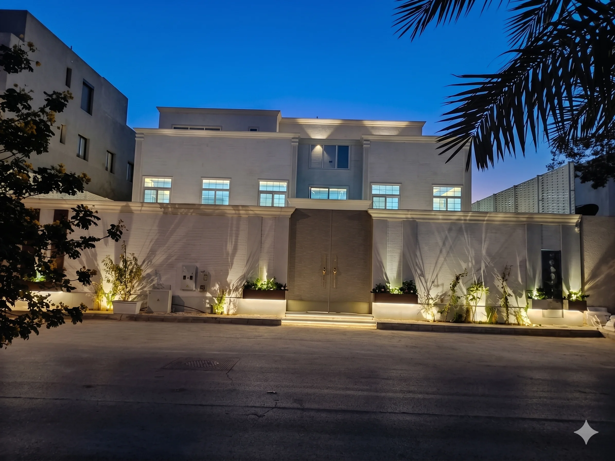 Riyadh villa exterior — acrylic foam stone façade at dusk